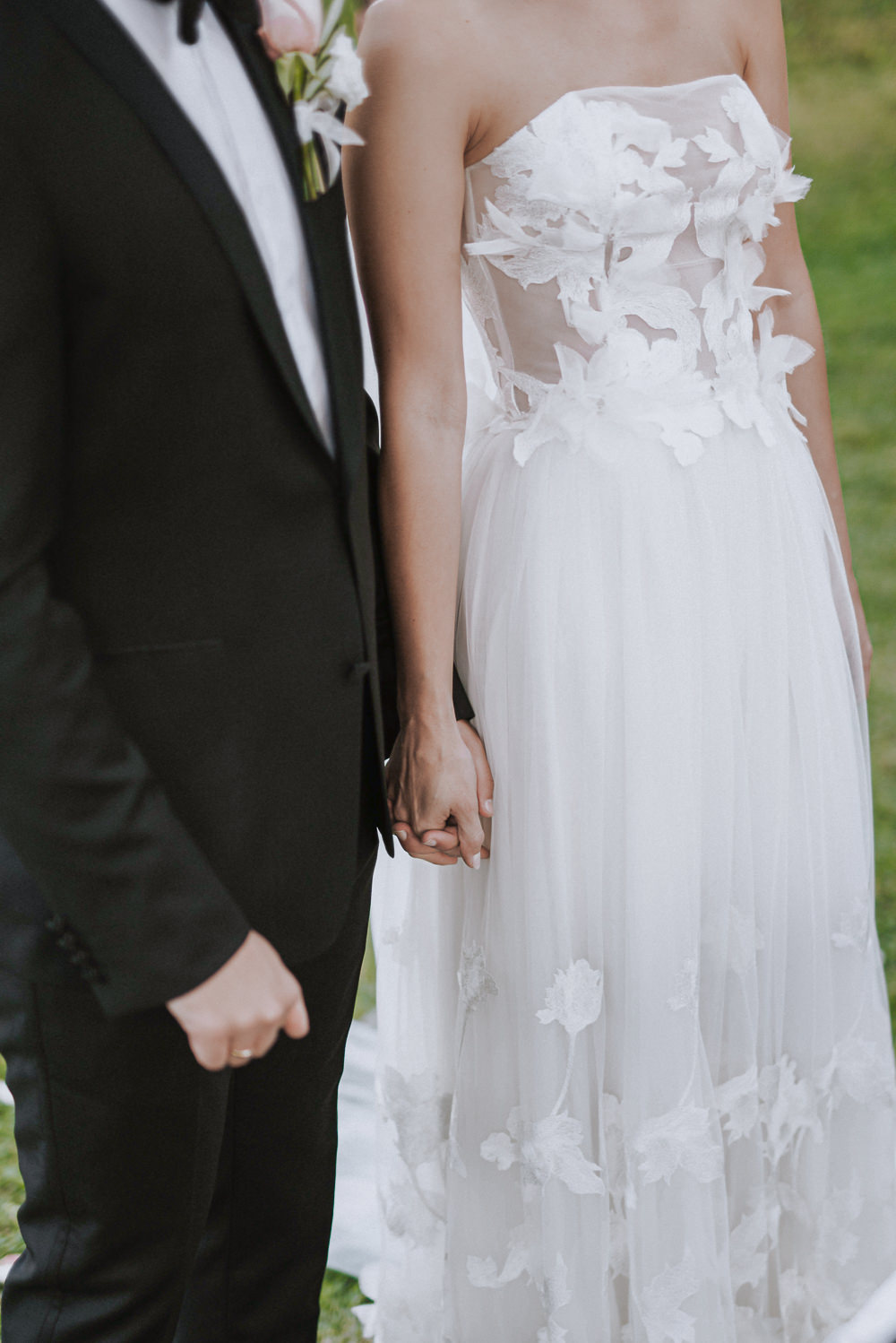 Bride and groom exchanging vows during a black-tie wedding ceremony at Martinis Marchi