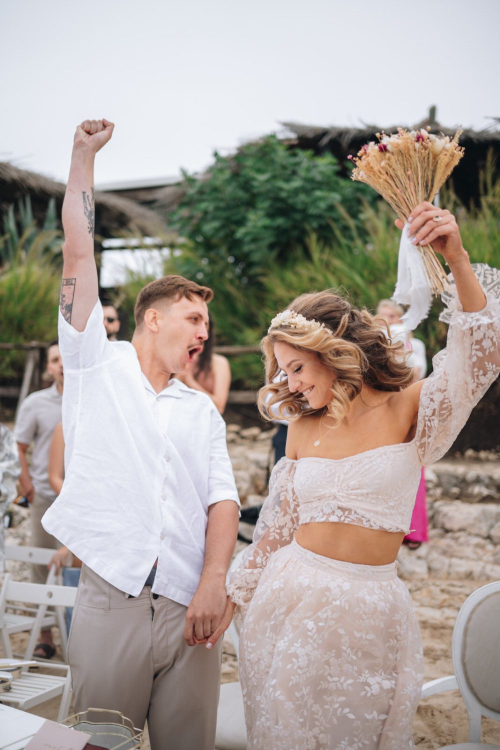 Newlyweds celebrating after wedding ceremony on Levan Island in Istria