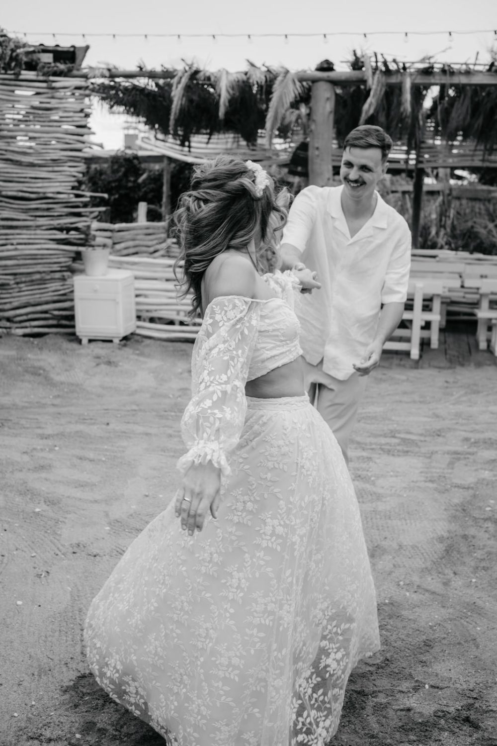 Bride and groom dancing in the sand at Levan Island Istria