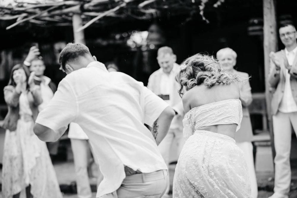 Bride and groom dancing in the sand at Levan Island Istria