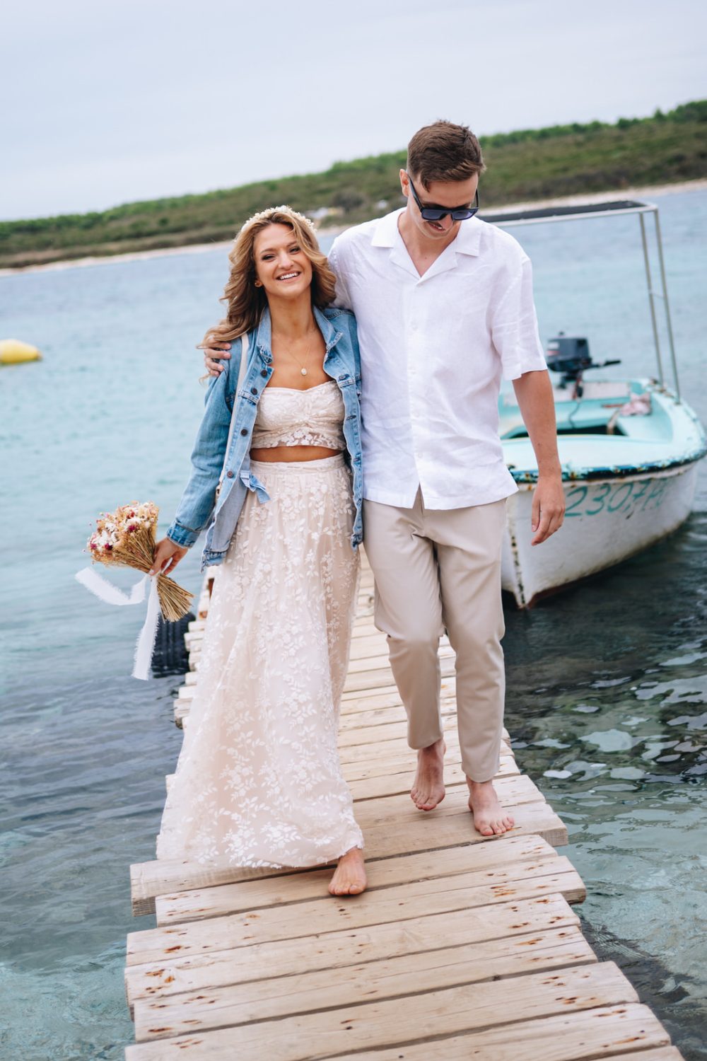 Bride and groom arriving to their wedding on Levan Island in Istria
