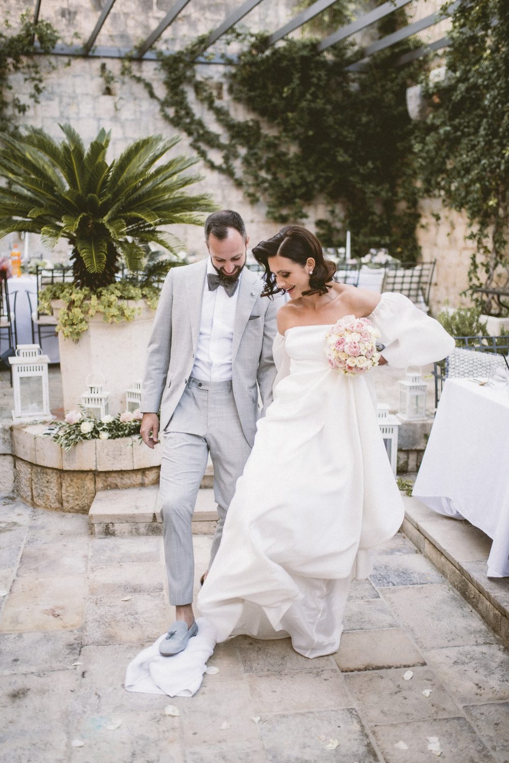 Bride and groom breaking glass at the San Giorgio Hotel in Vis