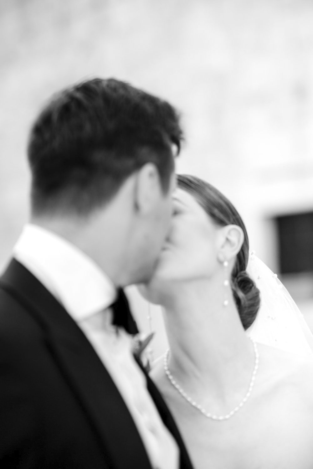 Newlyweds kissing