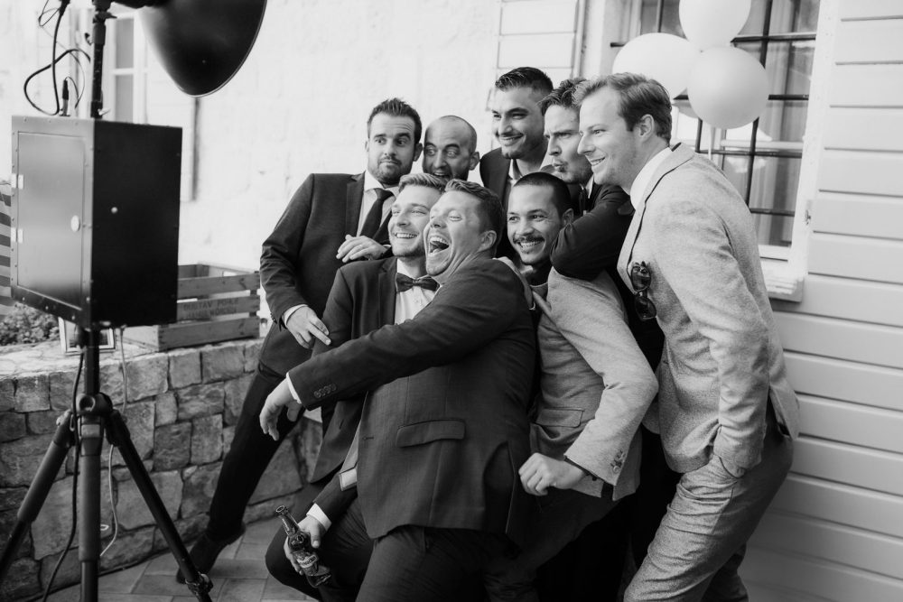 Groomsmen taking a selfie at Martinis Marchi Castle
